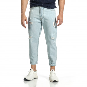 Loose fit мъжки сини дънки с прокъсвания - FASHIONMIX.BG Loose fit мъжки сини дънки с прокъсвания