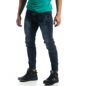 Тъмносини мъжки дънки с акценти Slim fit - FASHIONMIX.BG Тъмносини мъжки дънки с акценти Slim fit
