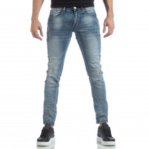 Slim fit мъжки сини дънки с прокъсвания - FASHIONMIX.BG Slim fit мъжки сини дънки с прокъсвания