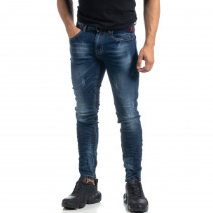 Изтъркани мъжки сини дънки с прокъсвания Slim fit - FASHIONMIX.BG Изтъркани мъжки сини дънки с прокъсвания Slim fit