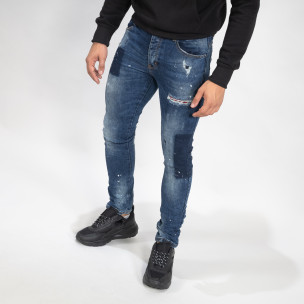 Мъжки сини дънки с пръски боя Slim fit - FASHIONMIX.BG Мъжки сини дънки с пръски боя Slim fit