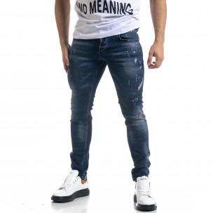 Мъжки сини дънки Slim fit с пръски боя - FASHIONMIX.BG Мъжки сини дънки Slim fit с пръски боя