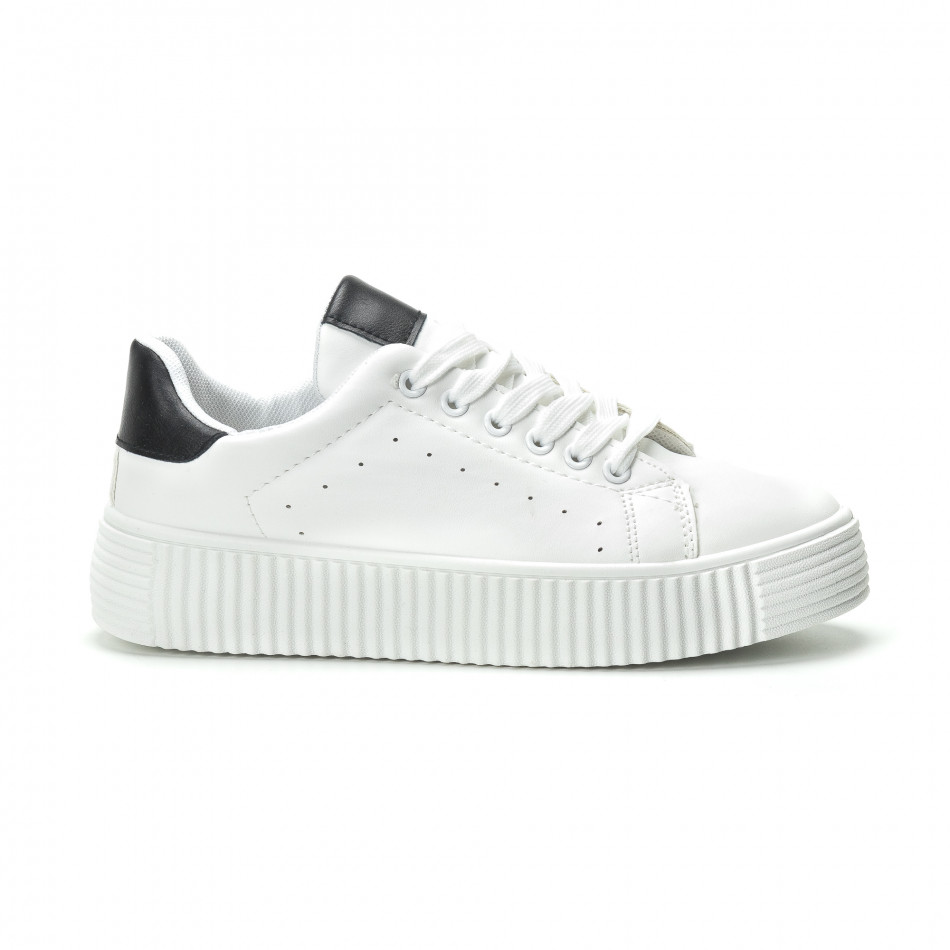 Γυναικεία λευκά sneakers με μαύρη λεπτομέρεια